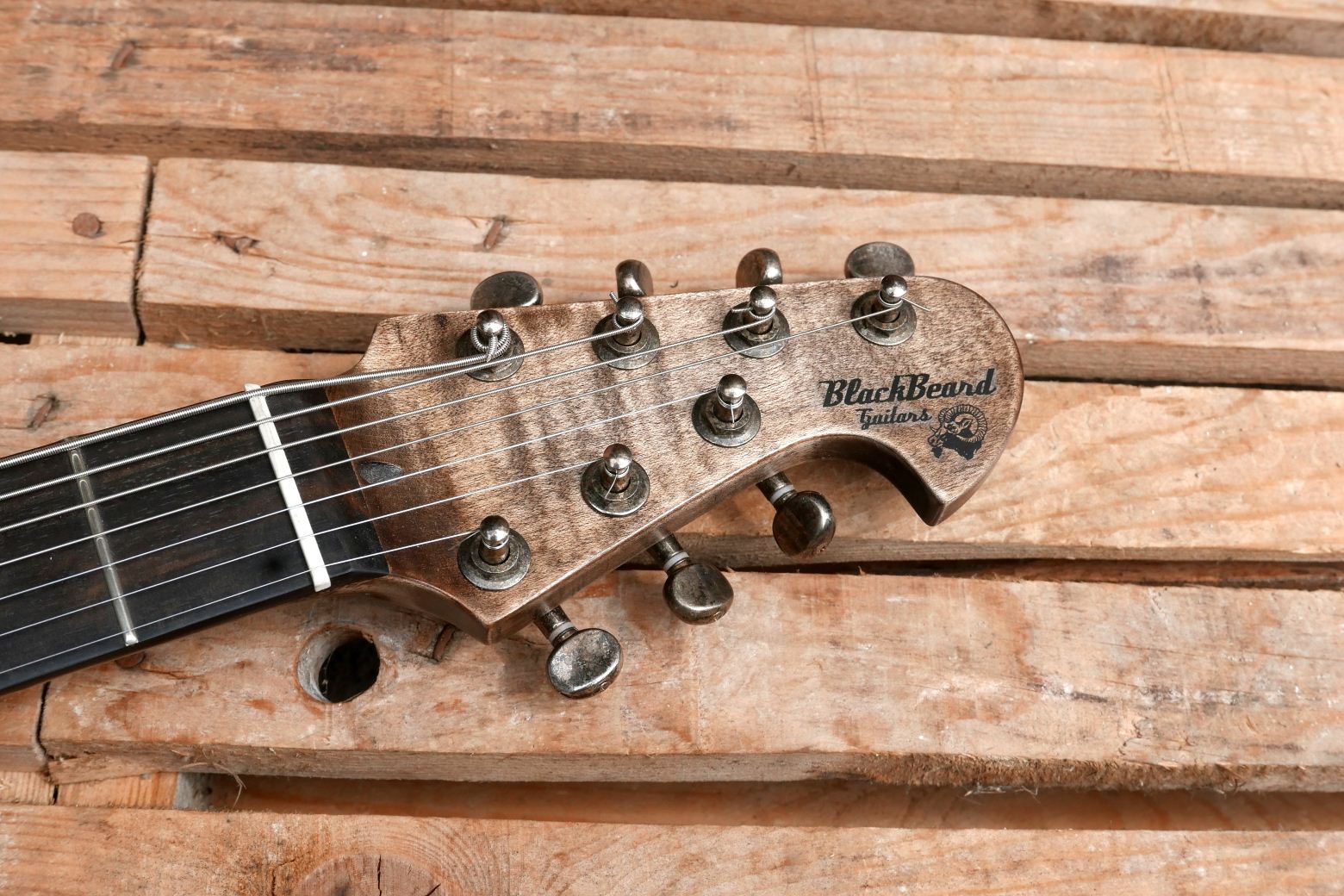 seven strings guitar headstock